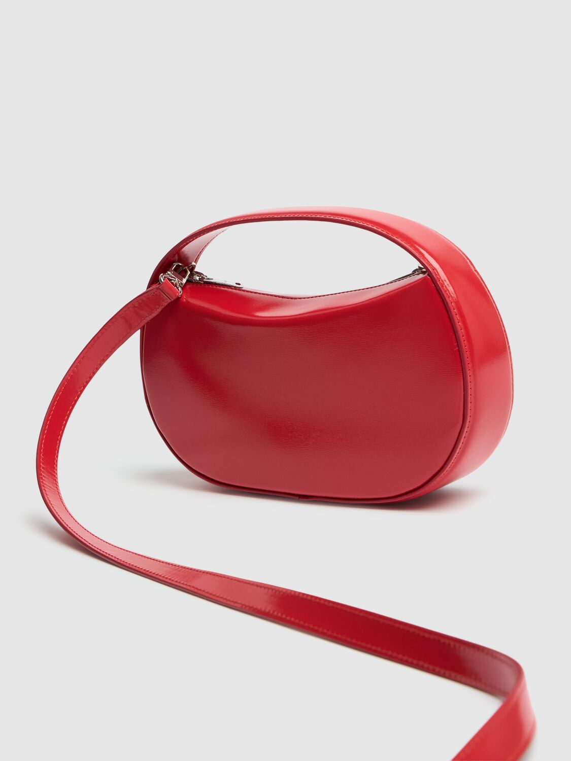 Shop Coperni Small Sound Swipe Leather Top Handle Bag In Red