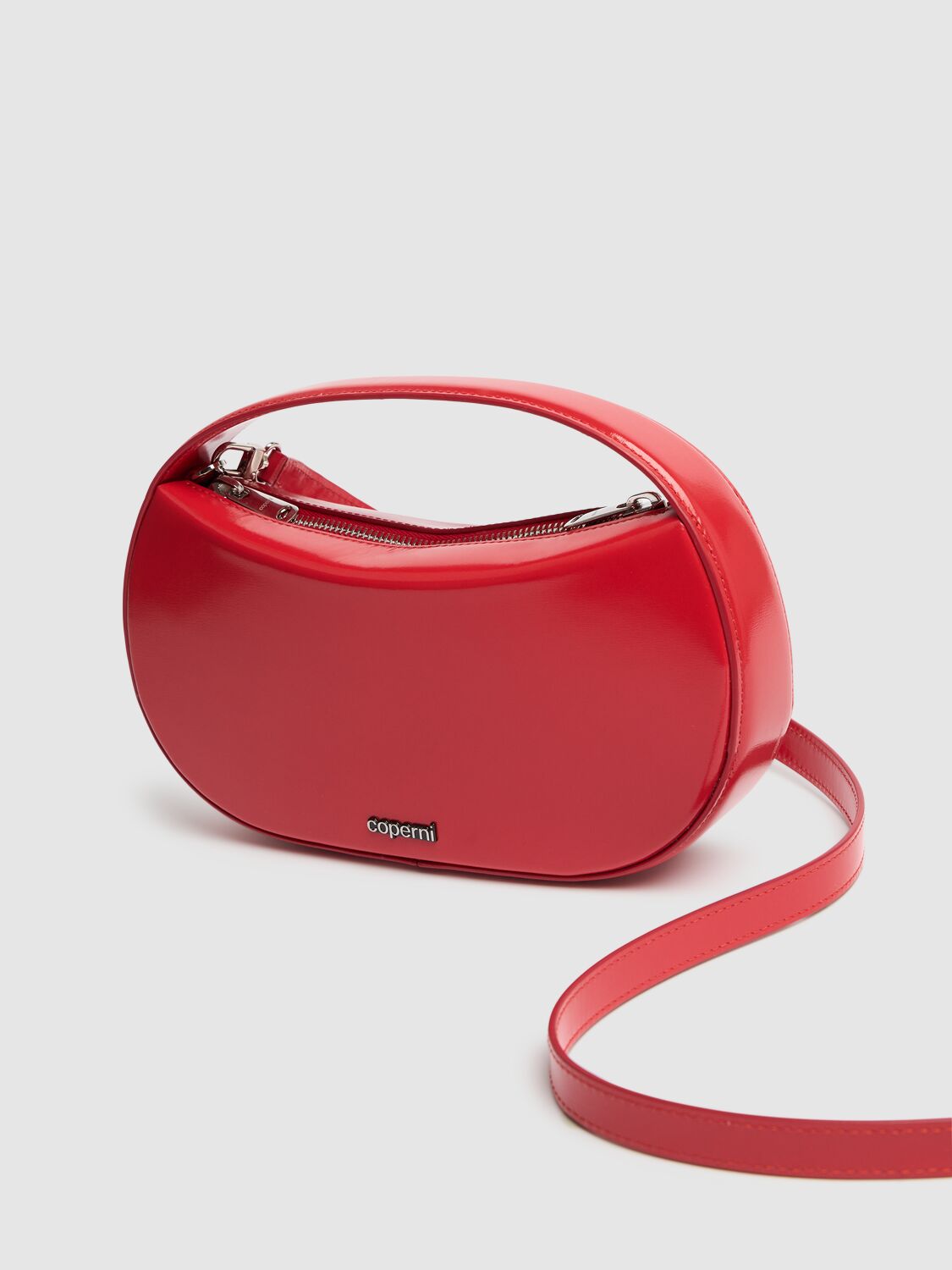 Shop Coperni Small Sound Swipe Leather Top Handle Bag In Red