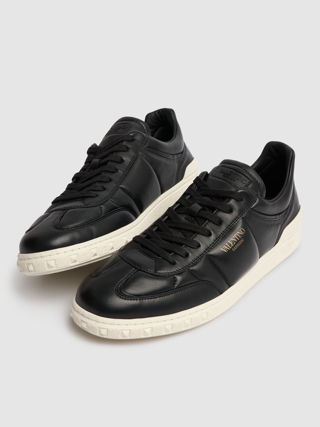 Shop Valentino Upvillage Padded Leather Low Sneakers In Black