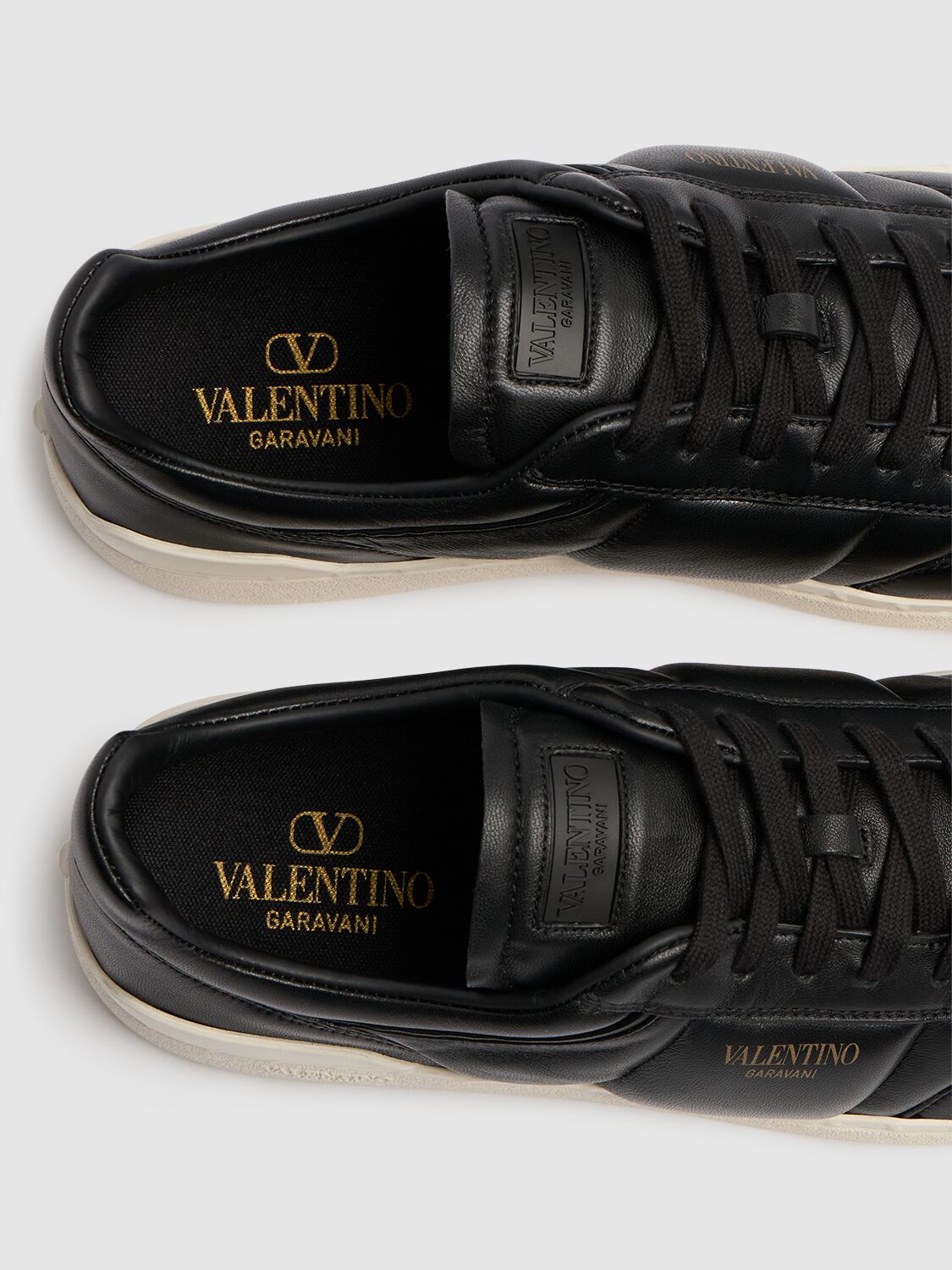 Shop Valentino Upvillage Padded Leather Low Sneakers In Black