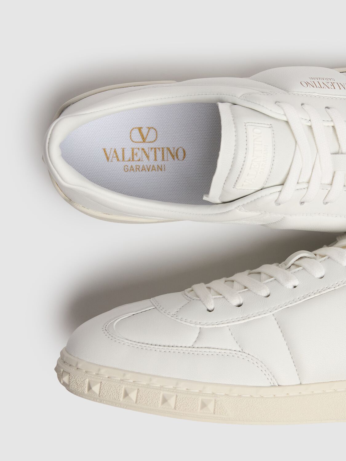 Shop Valentino Upvillage Padded Leather Low Sneakers In 白色