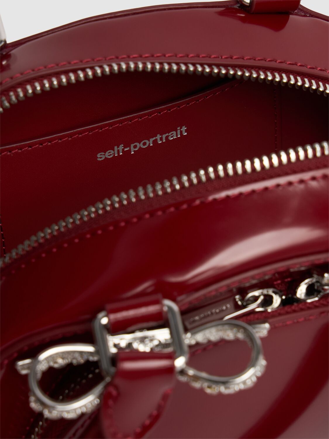 Shop Self-portrait Mini Leather Curved Top Handle Bag In Burgundy