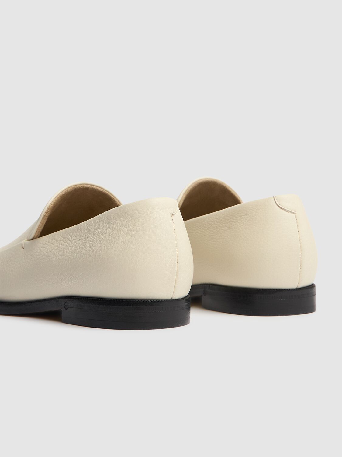 Shop Khaite 10mm Alessio Leather Loafers In Cream