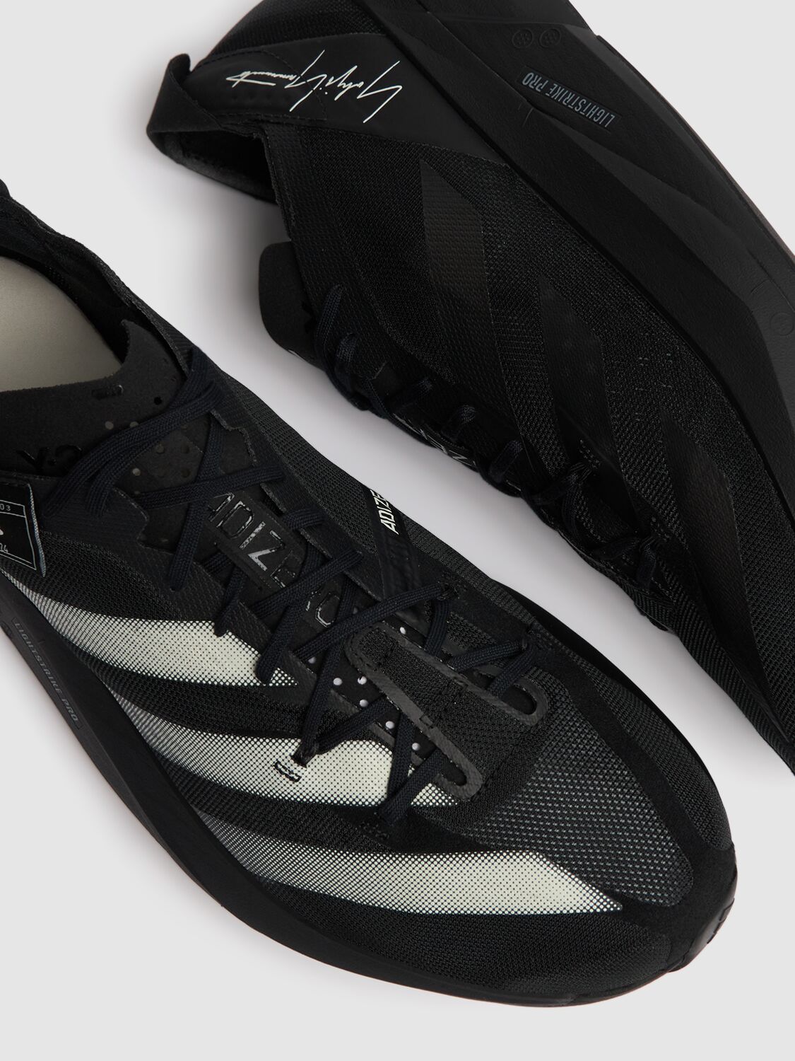 Shop Y-3 Adios Pro 3.0 Sneakers In Black