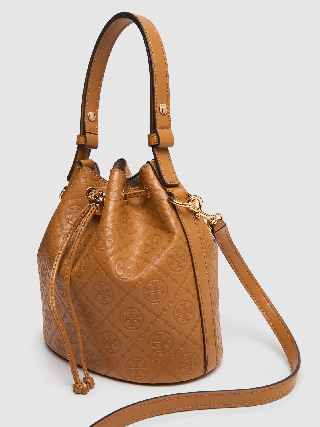 Shop Tory Burch T Monogram Leather Bucket Bag In Tan