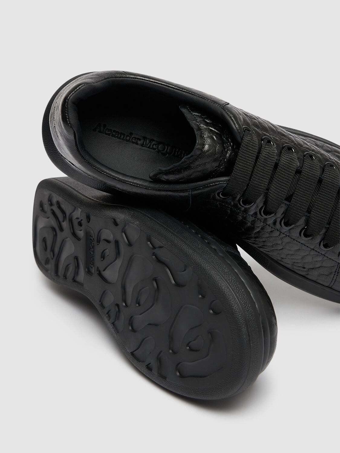 Shop Alexander Mcqueen Oversized Leather Sneakers In Black