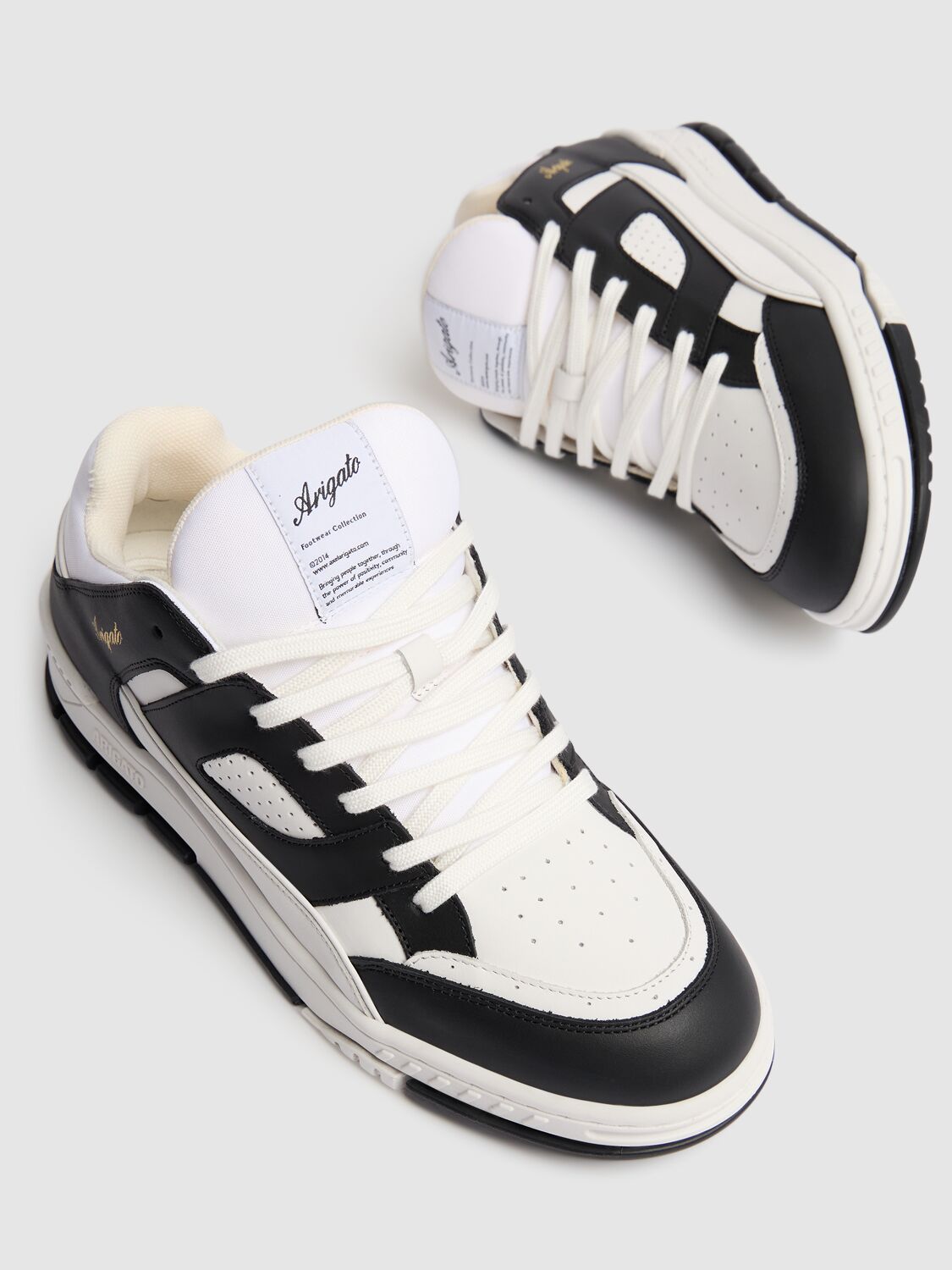 Shop Axel Arigato Area Lo Sneakers In White/black