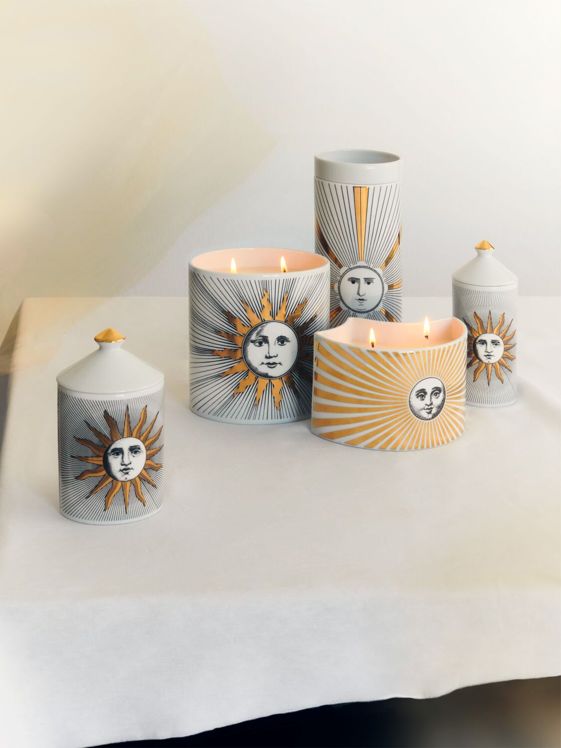 Shop Fornasetti Decoro Soli Candle In White/gold