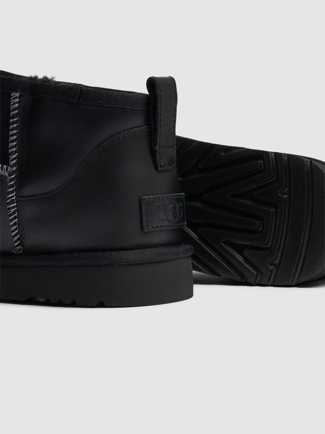 Shop Ugg Classic Ultra Mini Lthr Regen Boots In Black