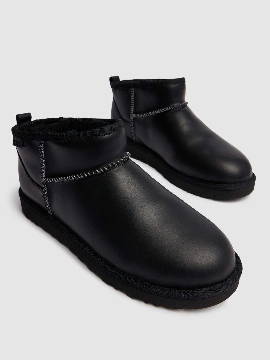 Shop Ugg Classic Ultra Mini Lthr Regen Boots In Black