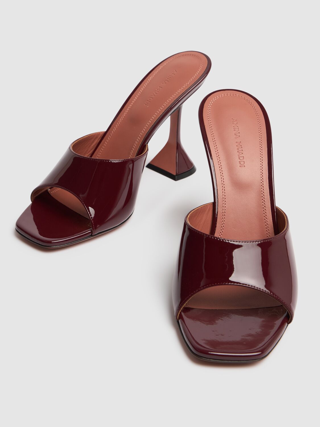 Shop Amina Muaddi 95mm Lupita Patent Leather Mules In Bordeaux