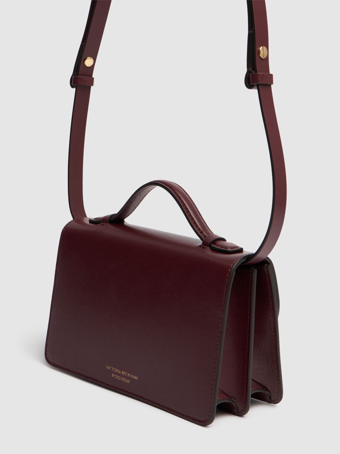 Shop Victoria Beckham Mini Bbuckle Shiny Leather Bag In Burgundy