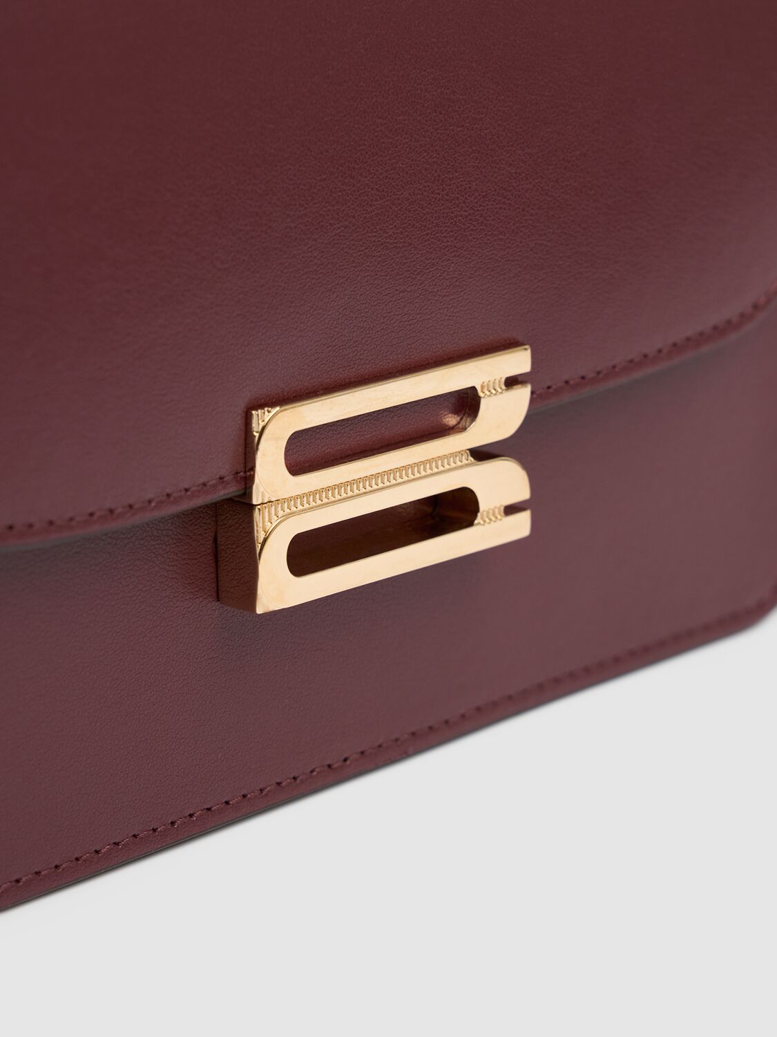 Shop Victoria Beckham Mini Bbuckle Shiny Leather Bag In Burgundy