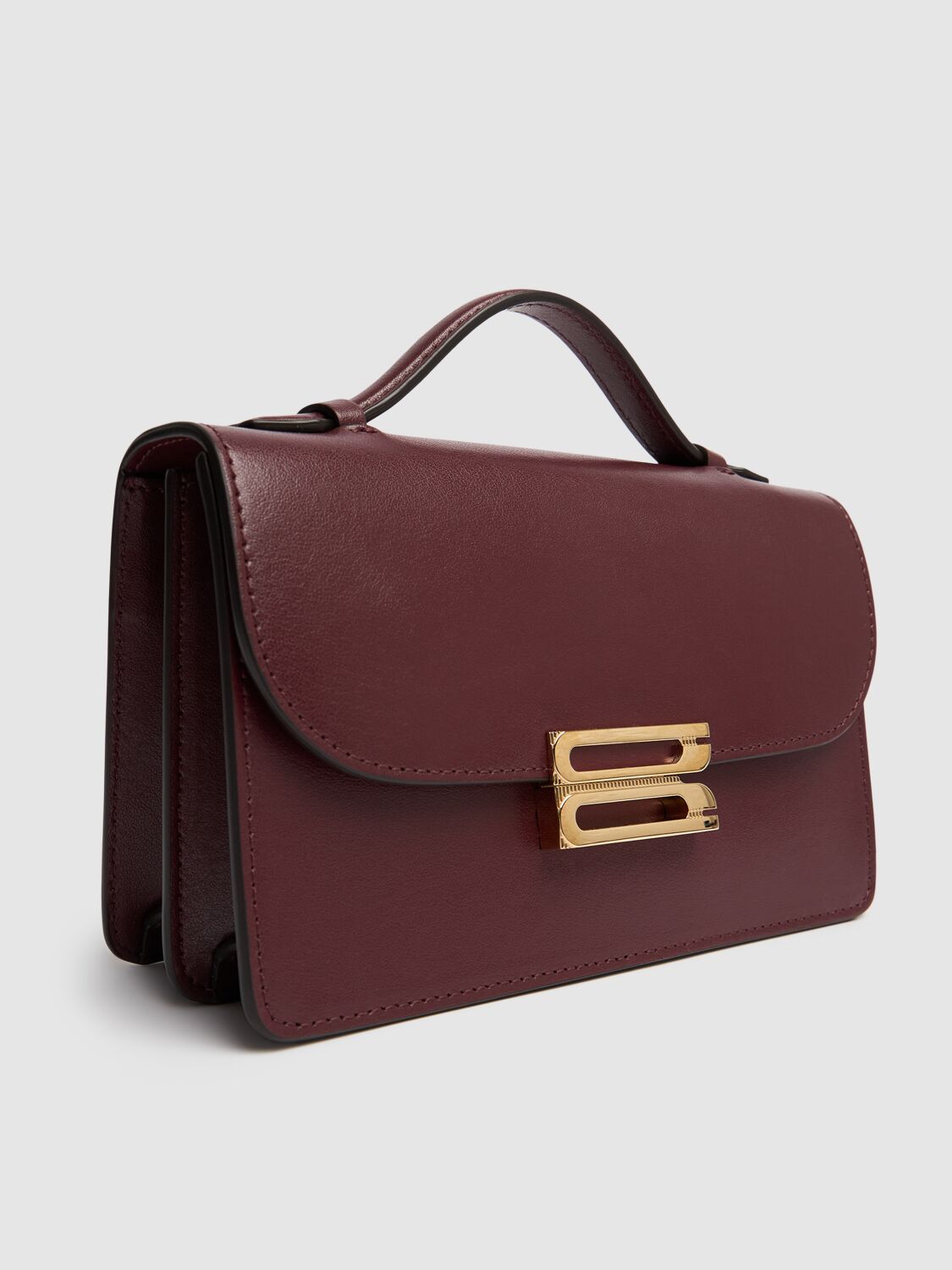 Shop Victoria Beckham Mini Bbuckle Shiny Leather Bag In Burgundy