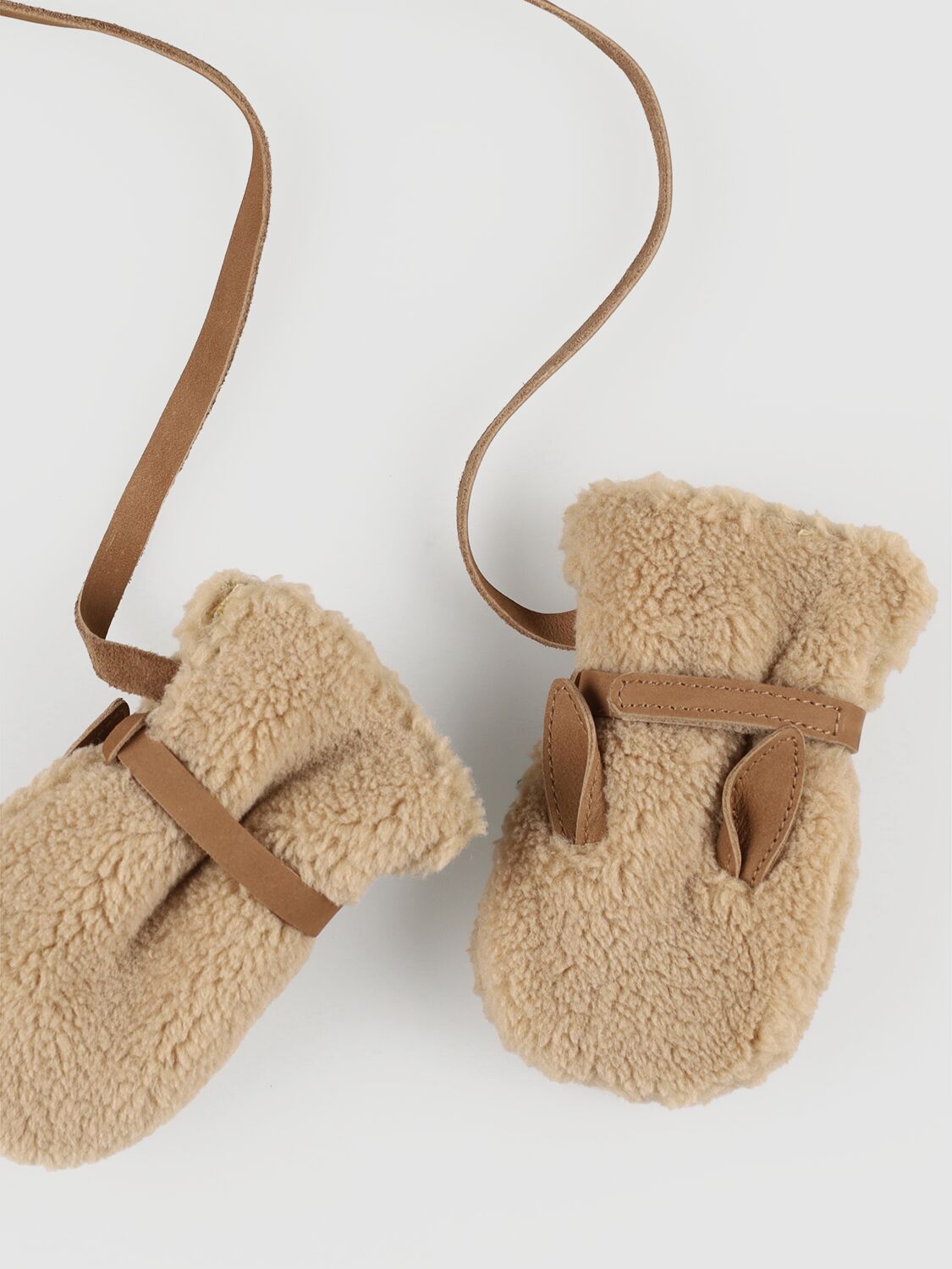 Shop Donsje Rabbit Mittens In Beige