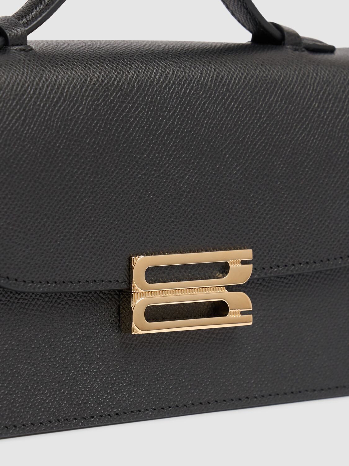 Shop Victoria Beckham Mini Bbuckle Leather Top Handle Bag In Black