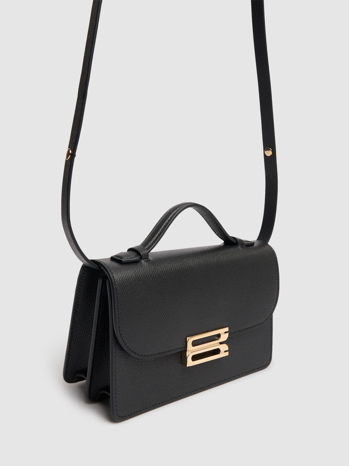 Shop Victoria Beckham Mini Bbuckle Leather Top Handle Bag In Black