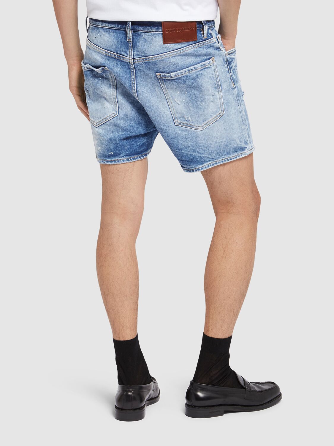 Dsquared2 Men Blue Jeans With Distressed Effect And Logo Patch On The Back In Denim Man In Blue