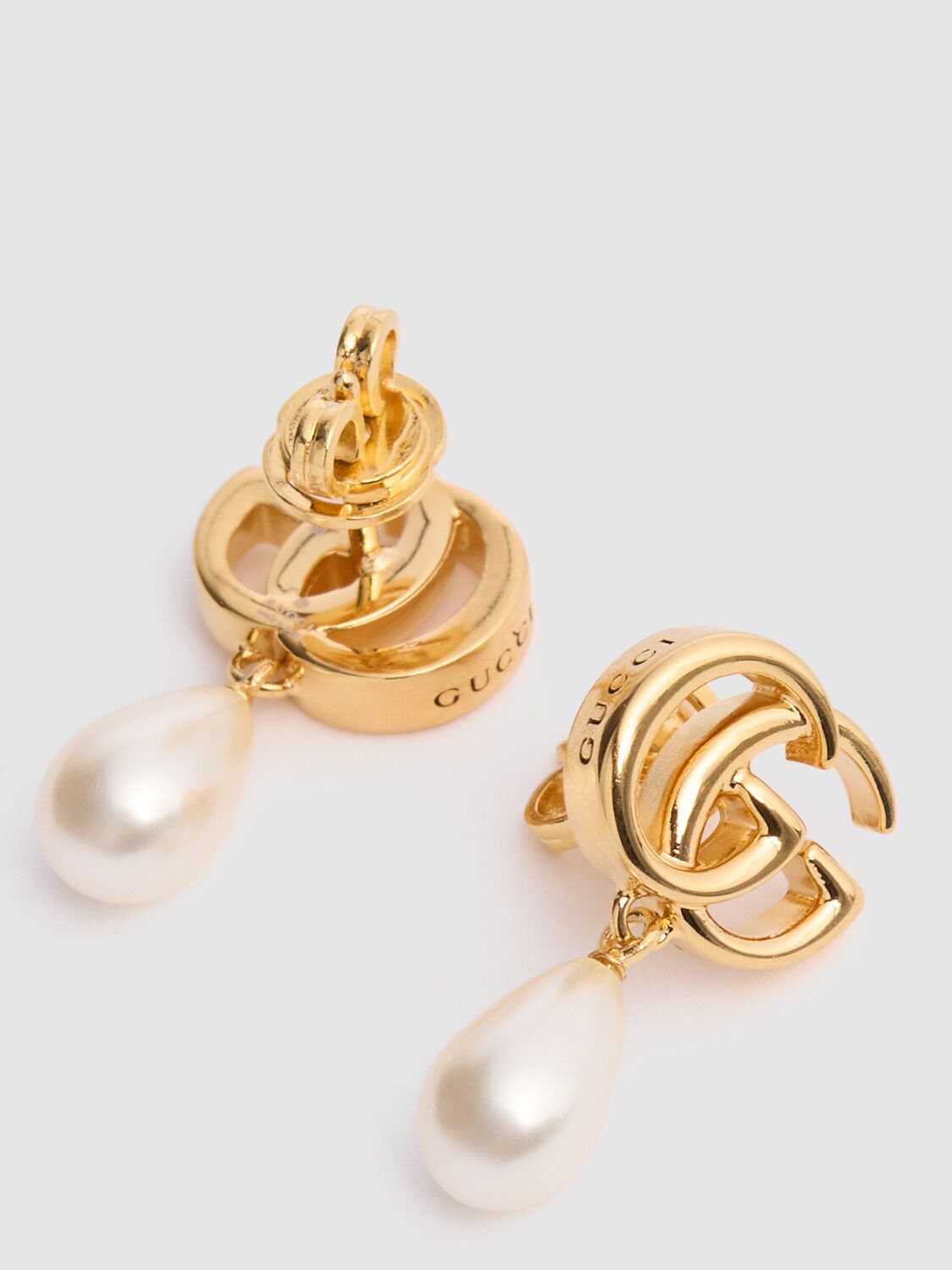 Shop Gucci Gg Marmont Brass Pearl Drop Earrings In Gold