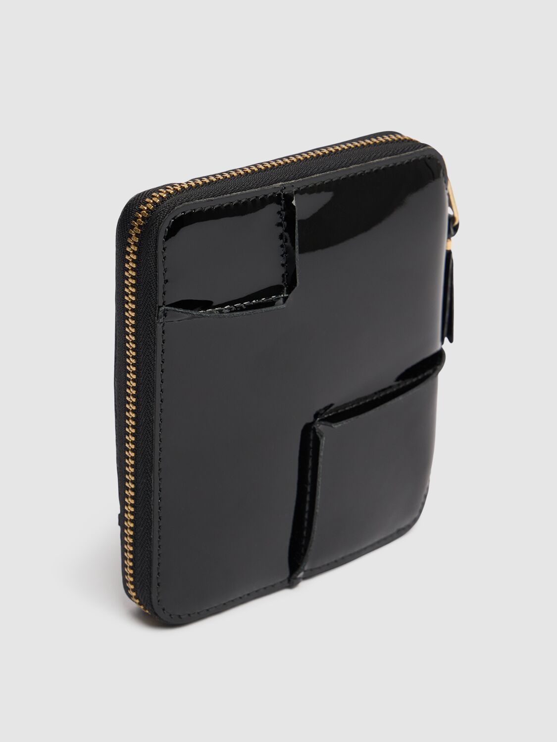 COMME DES GARÇONS REVERSED HEM PATENT ZIP AROUND WALLET 
