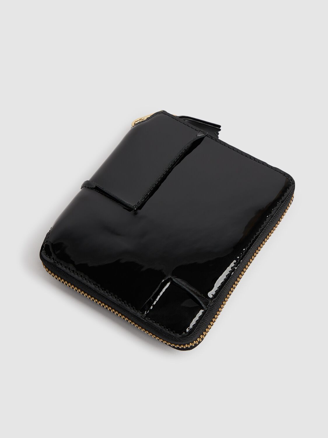 COMME DES GARÇONS REVERSED HEM PATENT ZIP AROUND WALLET 