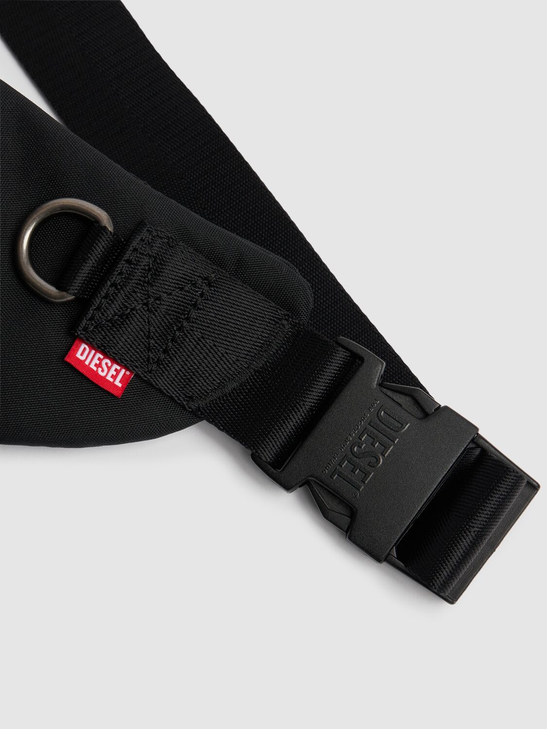 Shop Diesel Embossed Logo Tech Belt Bag In Black