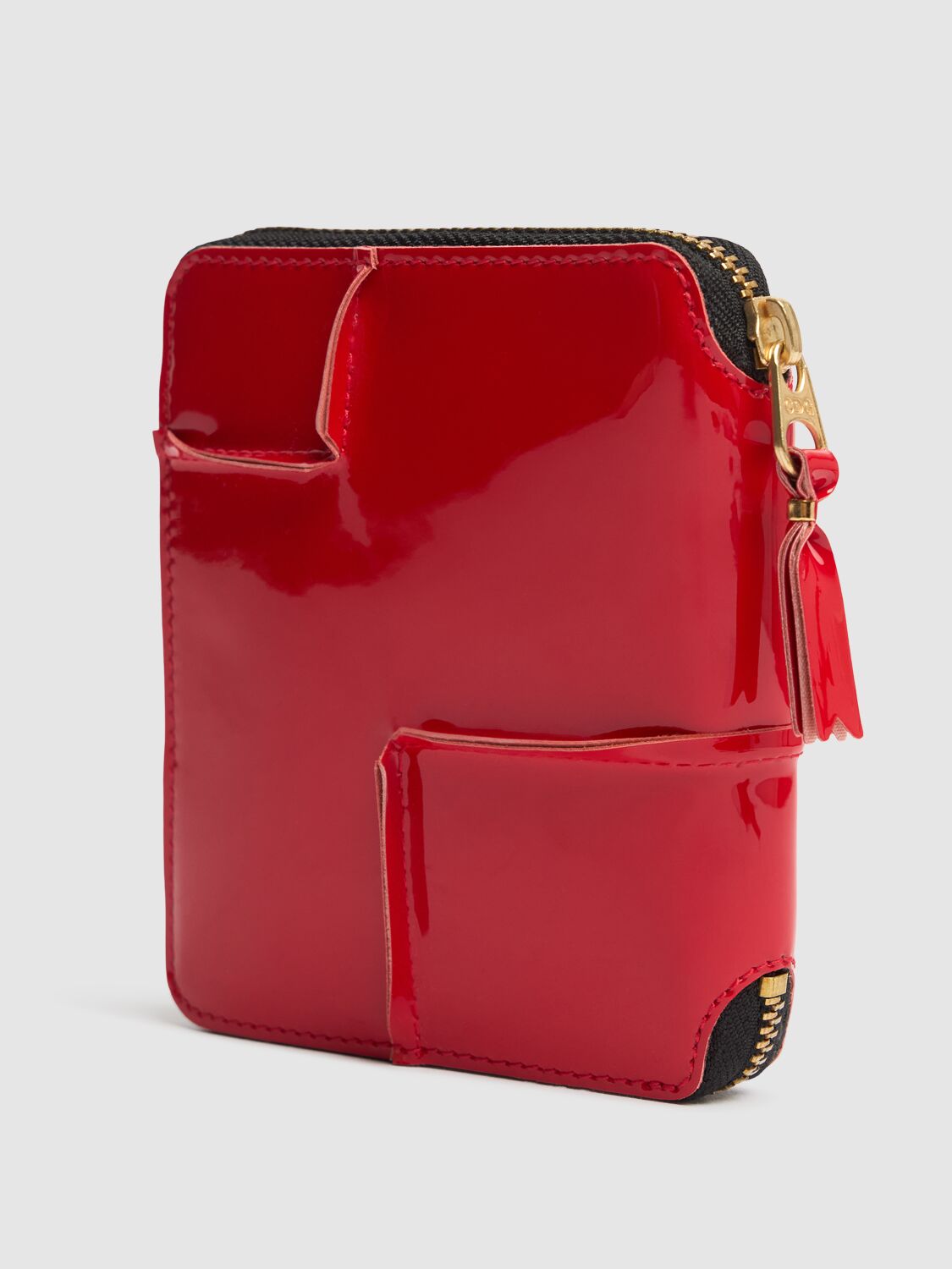 COMME DES GARÇONS REVERSED HEM PATENT ZIP AROUND WALLET 