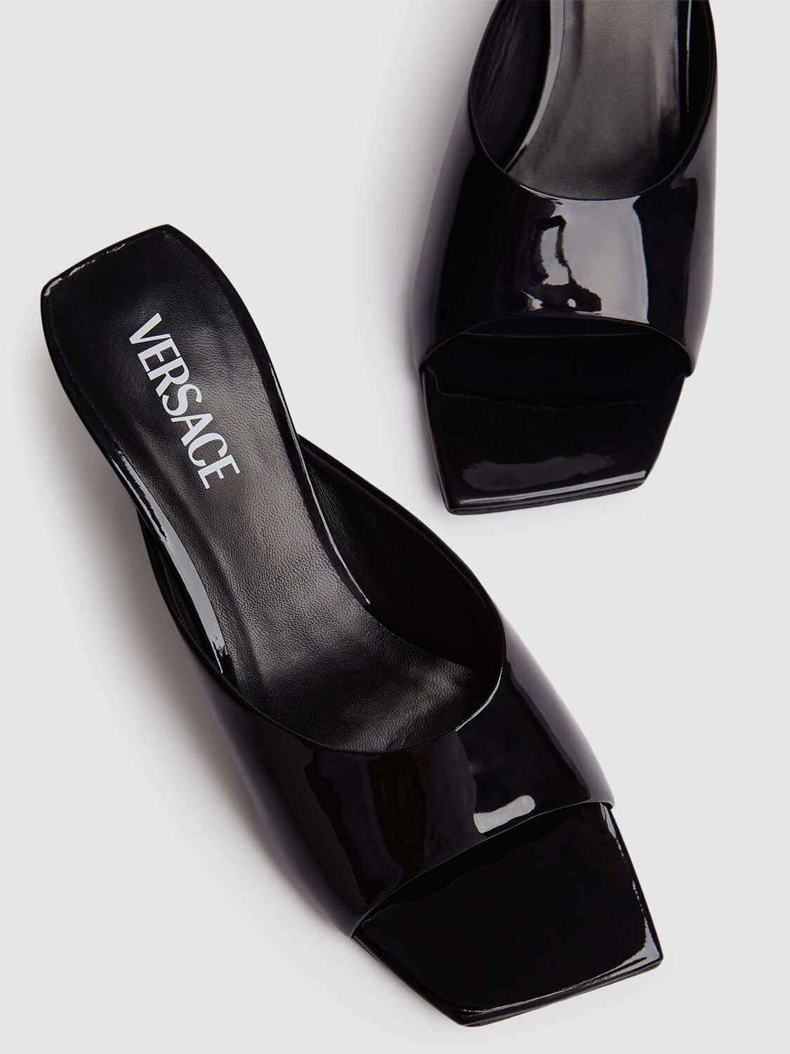 Shop Versace 55mm Patent Leather Mules In Black