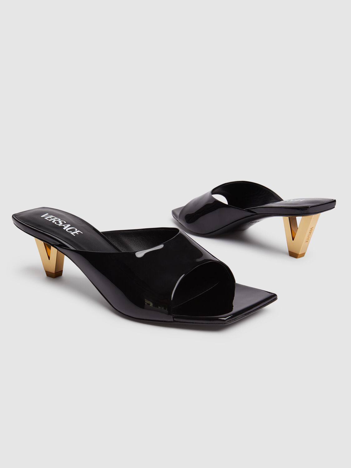 Shop Versace 55mm Patent Leather Mules In Black