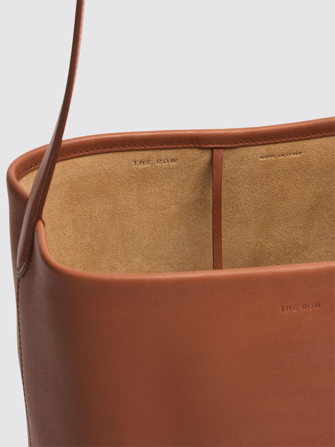 The Row Medium N/s Park Saddle Shiny Leather Bag In Dark Cuir