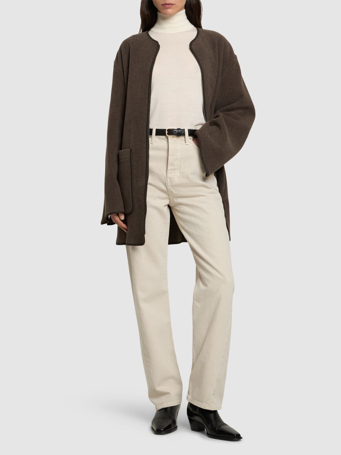 Shop Totême Twisted Seam Mid Rise Denim Jeans In Grey