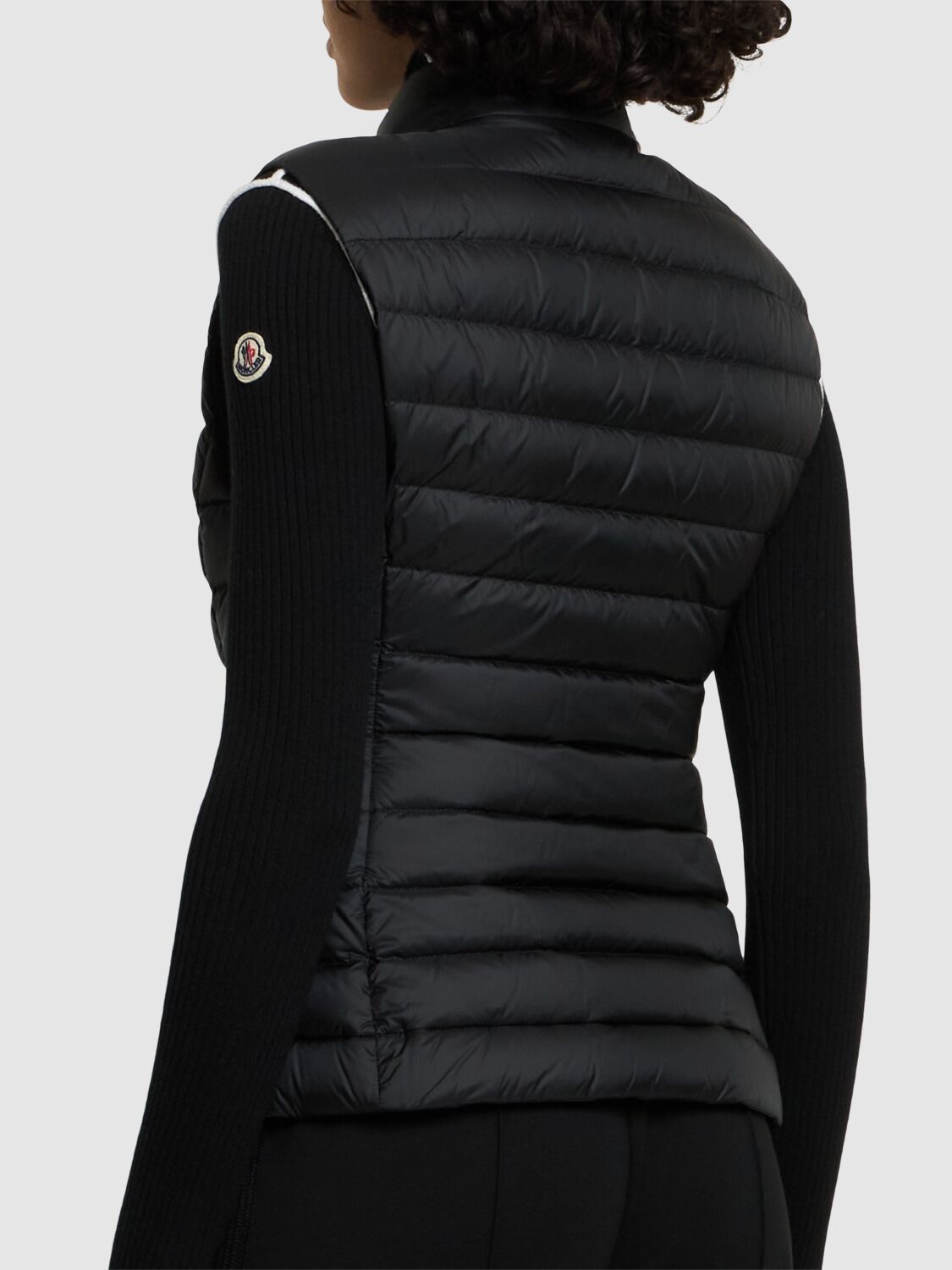 Moncler Quilted Black Vest With High Collar And Fitted Silhouette In 黑色