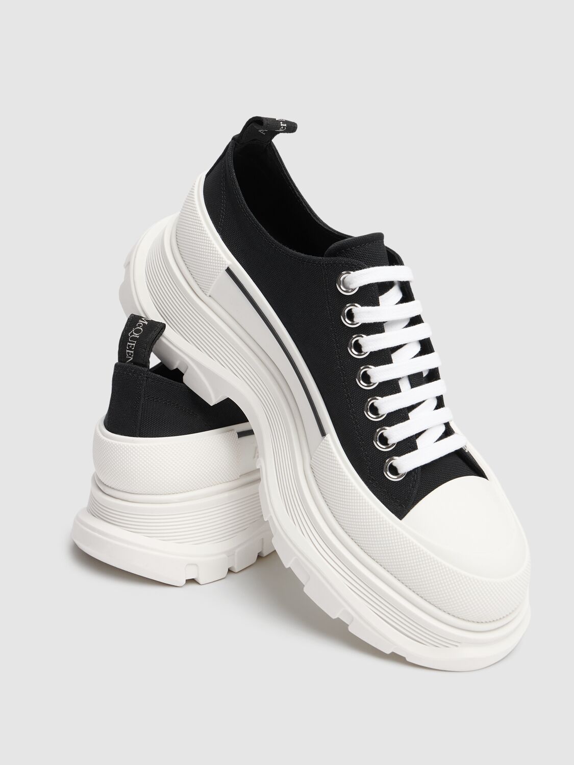 Shop Alexander Mcqueen 45mm Tread Slick Lace-up Sneakers In Black,white
