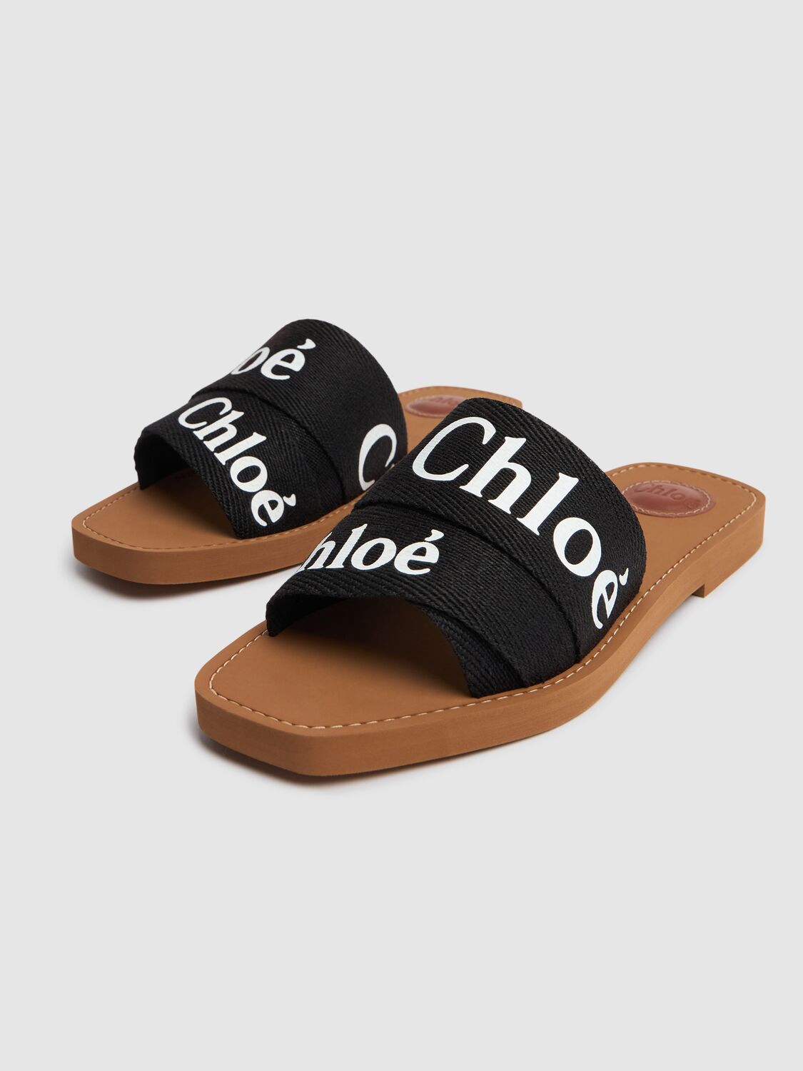 Chloé Woody Flat Logo Ribbon Slide Sandals In Black
