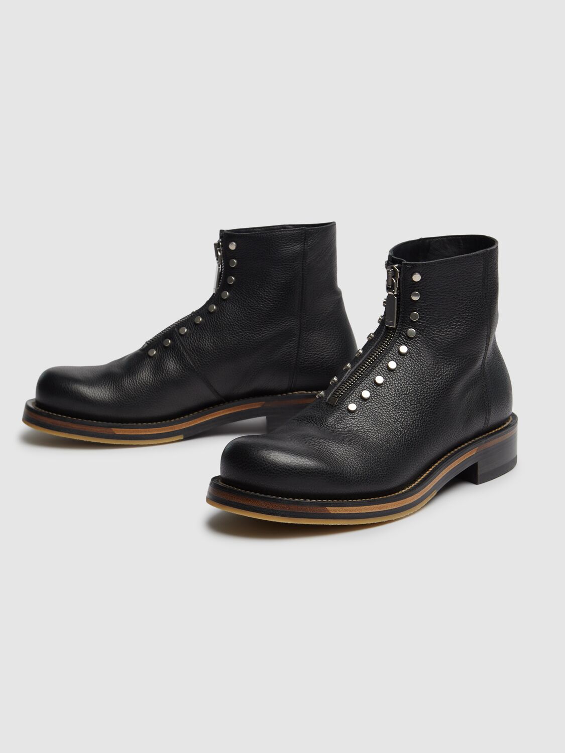 Alexander Mcqueen Chunky Sole Round Toe Studded Ankle Boots In Black