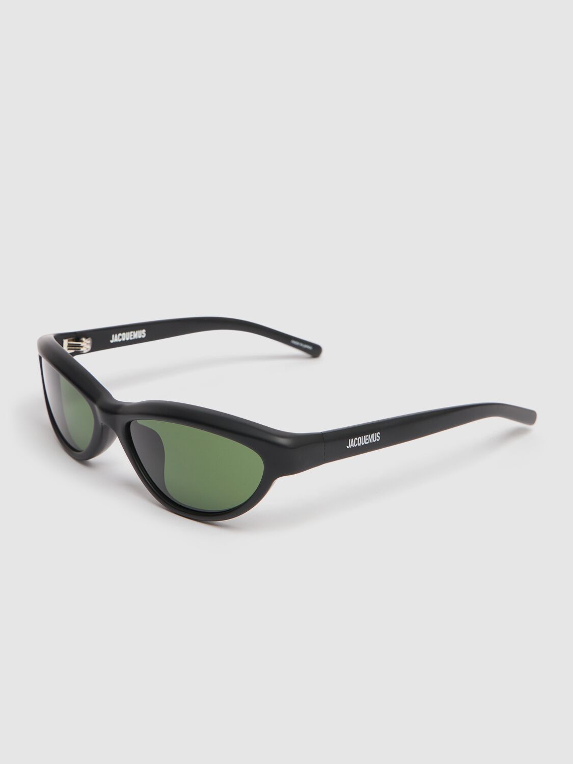 Shop Jacquemus Les Lunettes Curvo Sunglasses