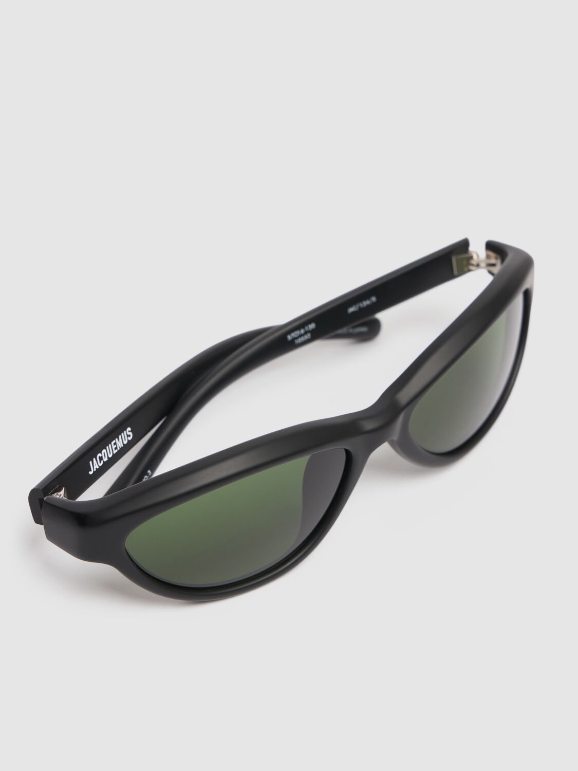 Shop Jacquemus Les Lunettes Curvo Sunglasses