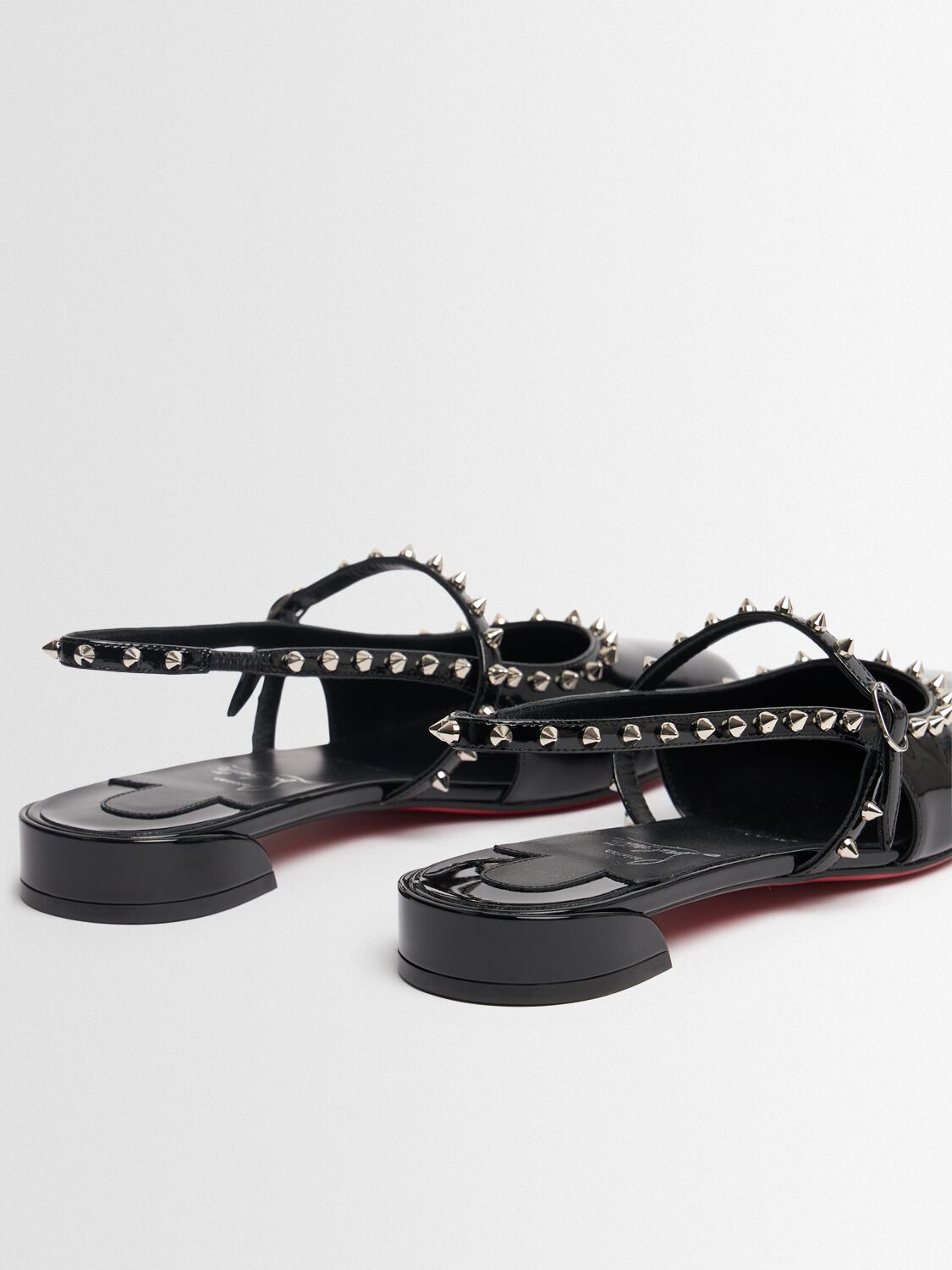 Christian Louboutin Sweet Janispikes Studded Patent-leather Slingback Flats