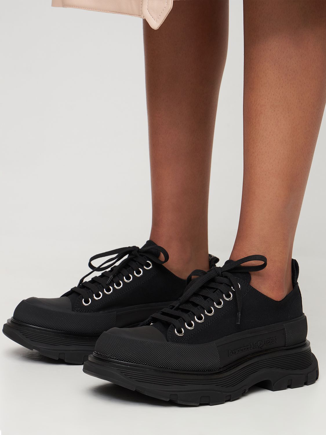 Shop Alexander Mcqueen 45mm Tread Slick Canvas Sneakers In Black