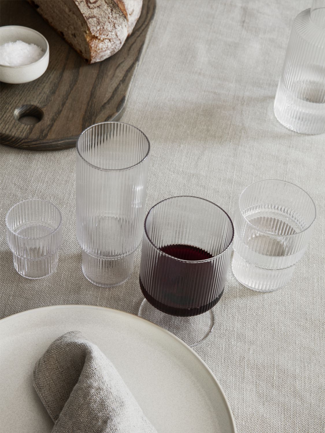 Shop Ferm Living Set Of 4 Tall Ripple Glasses In Transparent