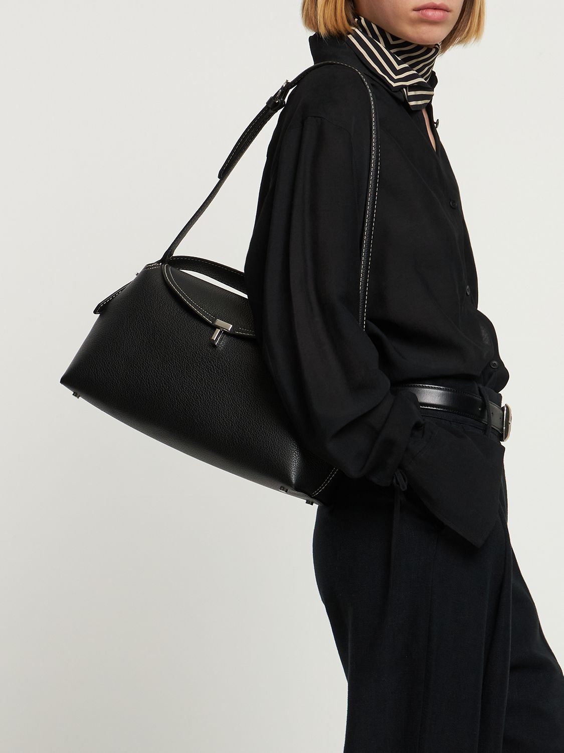 Shop Totême T-lock Leather Top Handle Bag In Black