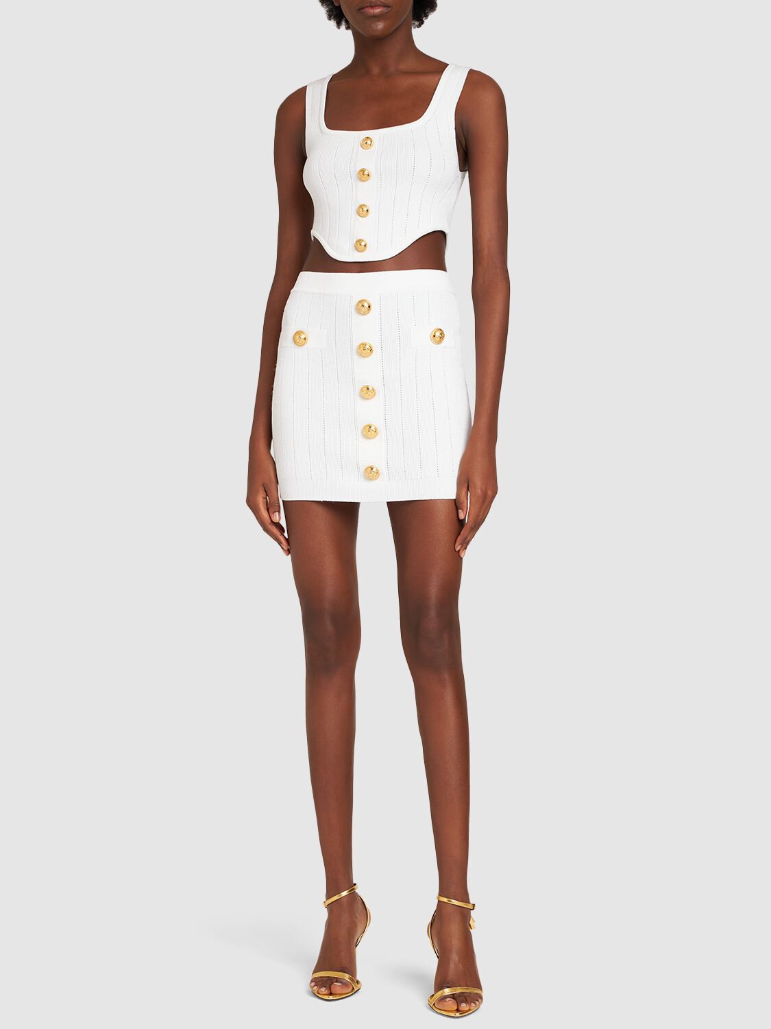 BALMAIN RIBBED KNIT MINI SKIRT W/ BUTTONS 