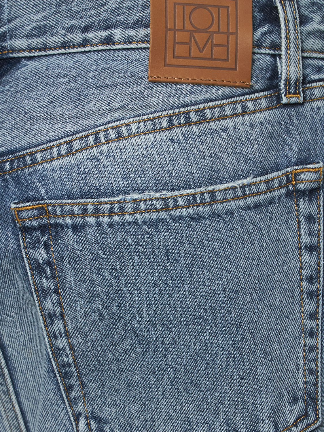 TOTÊME TWISTED SEAM FULL LENGTH DENIM JEANS 