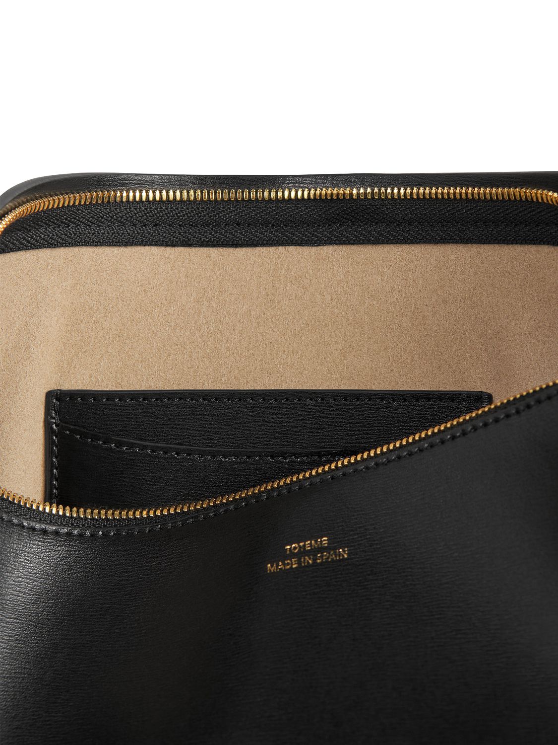 Shop Totême Scoop Palmellata Leather Shoulder Bag In Black