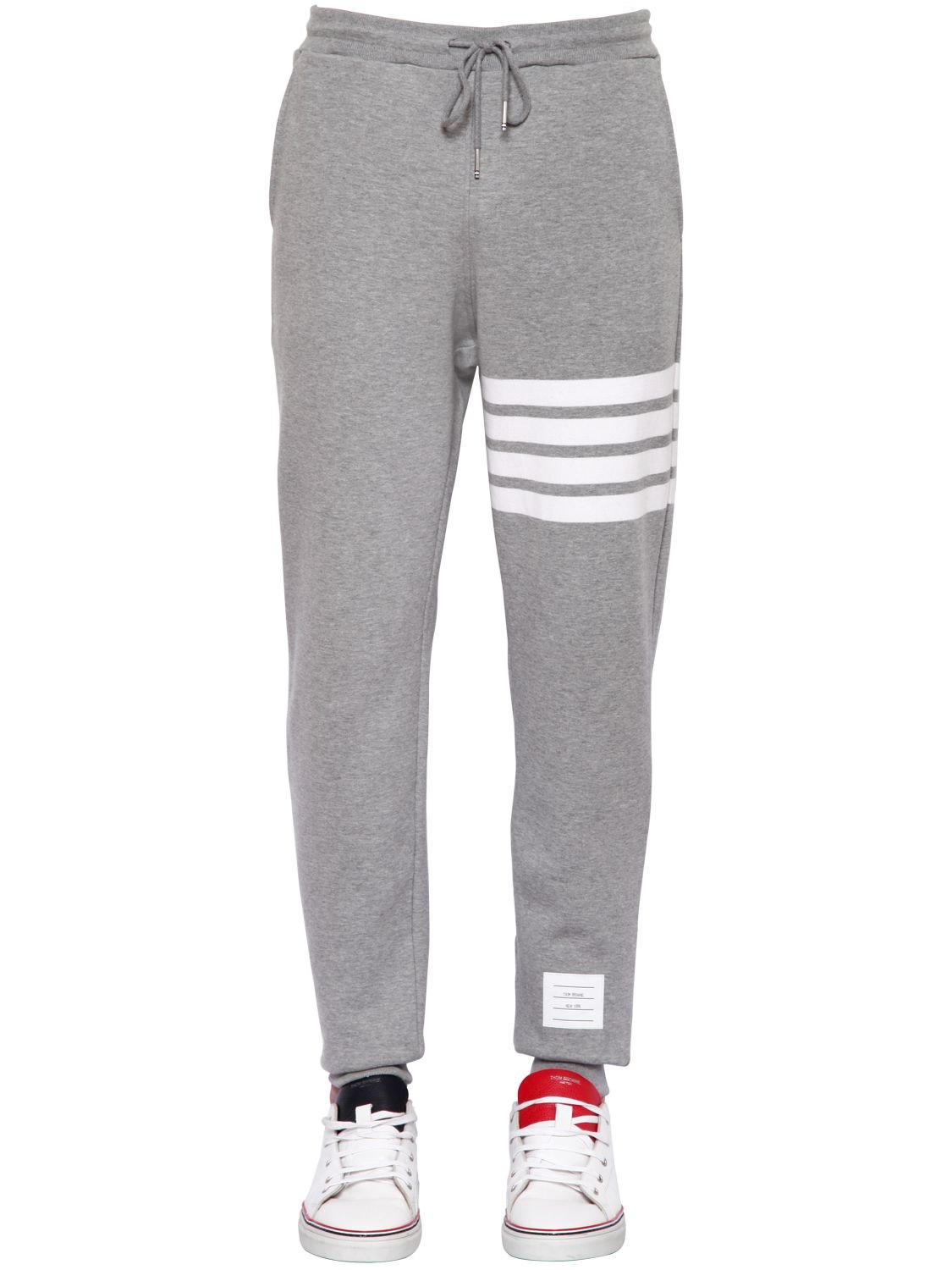 sweatpants with stripes on one leg