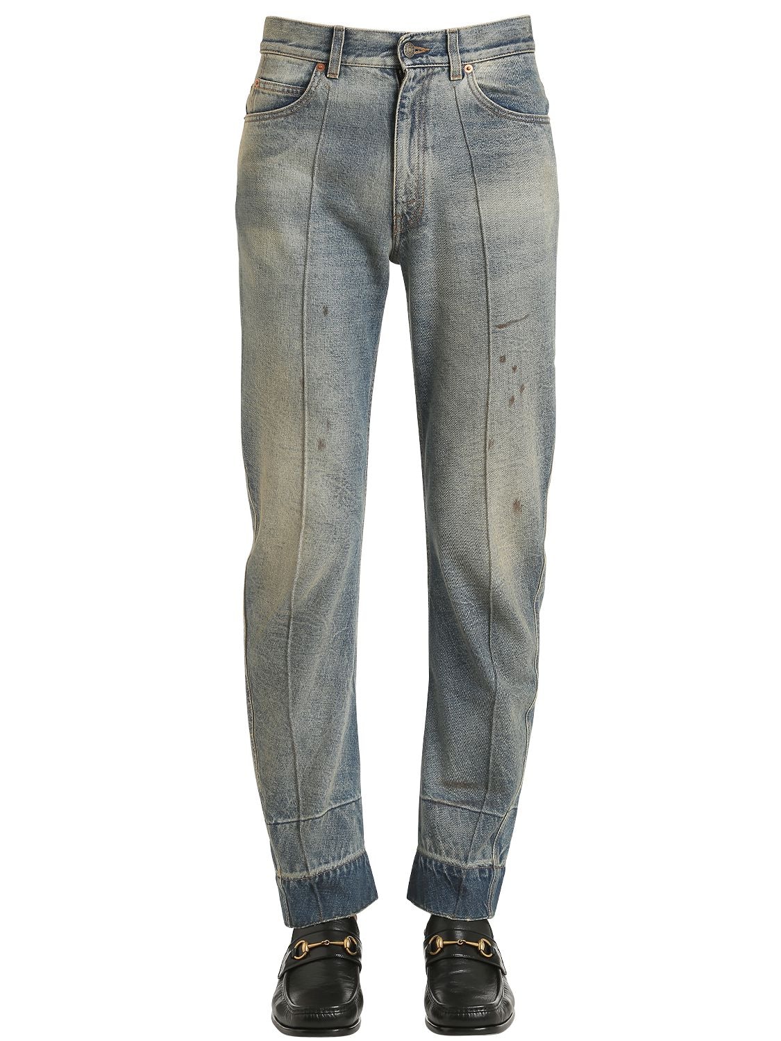 Gucci Resin Coated Stone Washed Denim Jeans In Blue