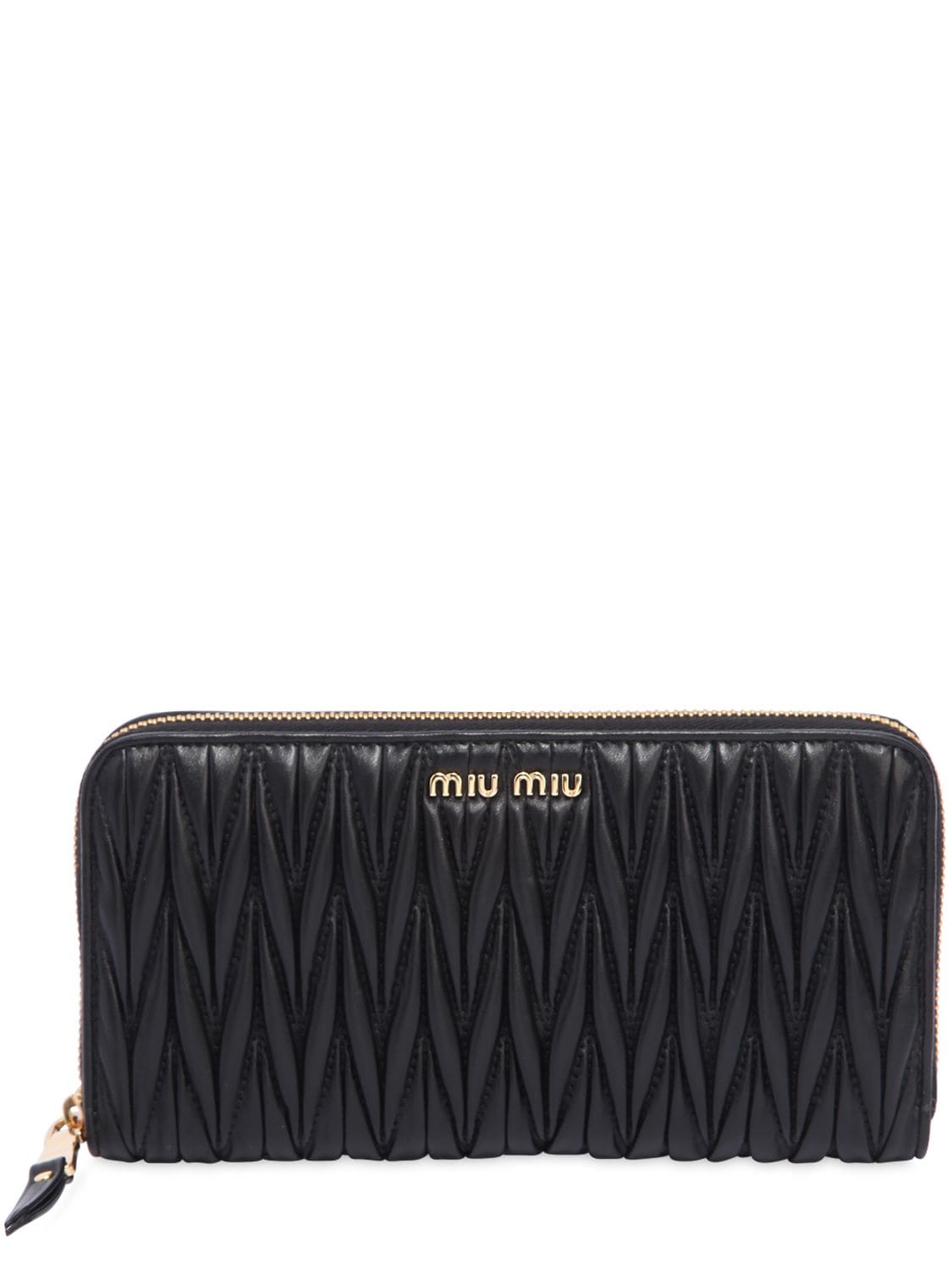 Miu Miu Quilted Leather Zip Around Wallet In Black