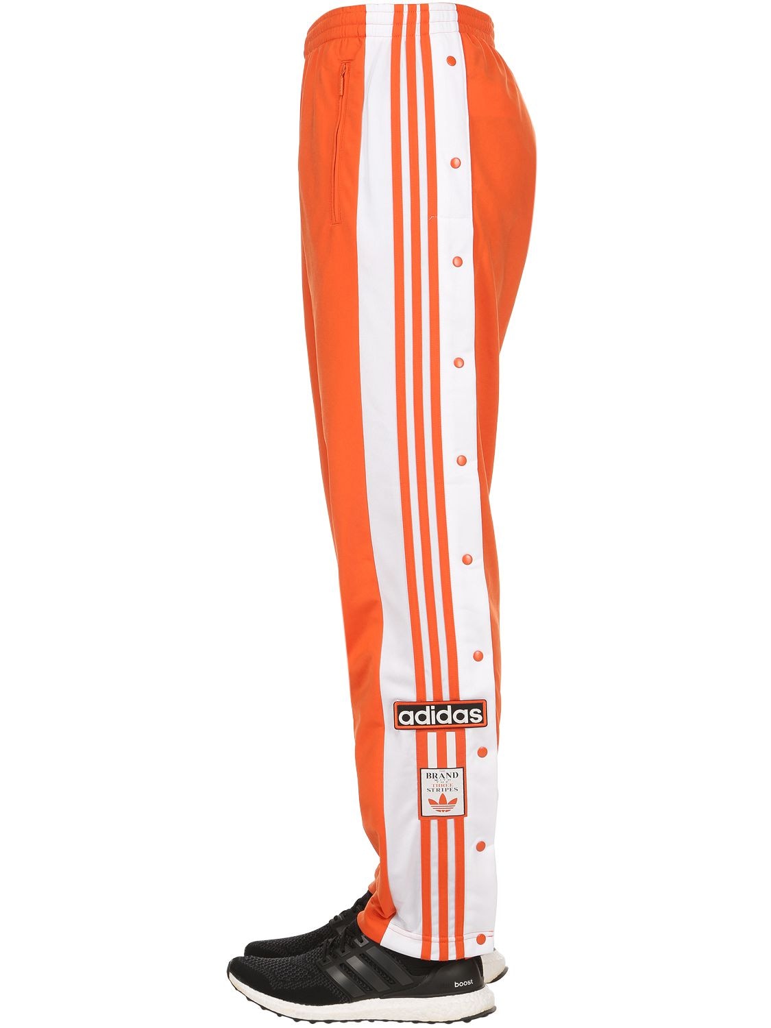 adibreak track pants orange