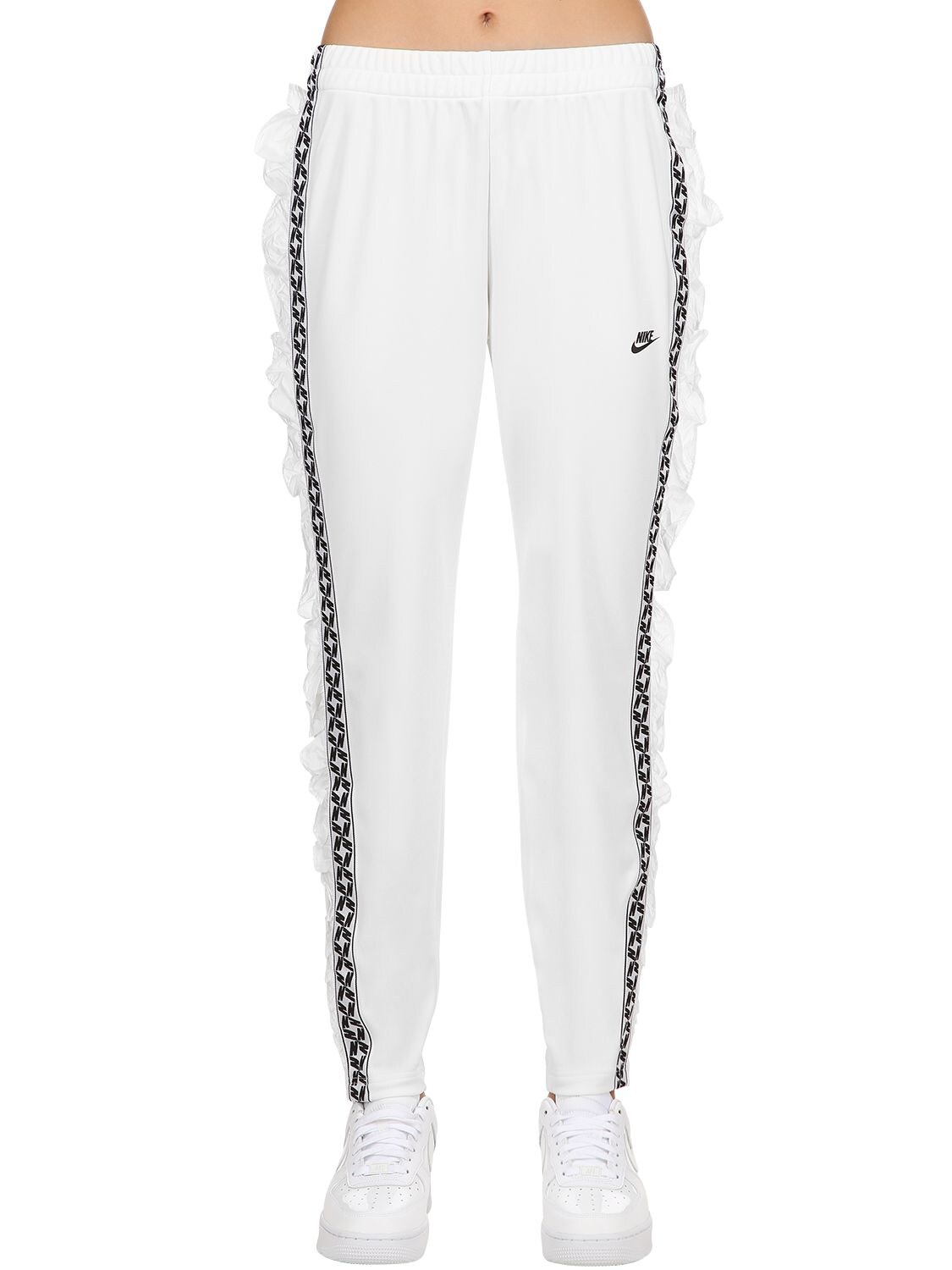 nike track pants taped