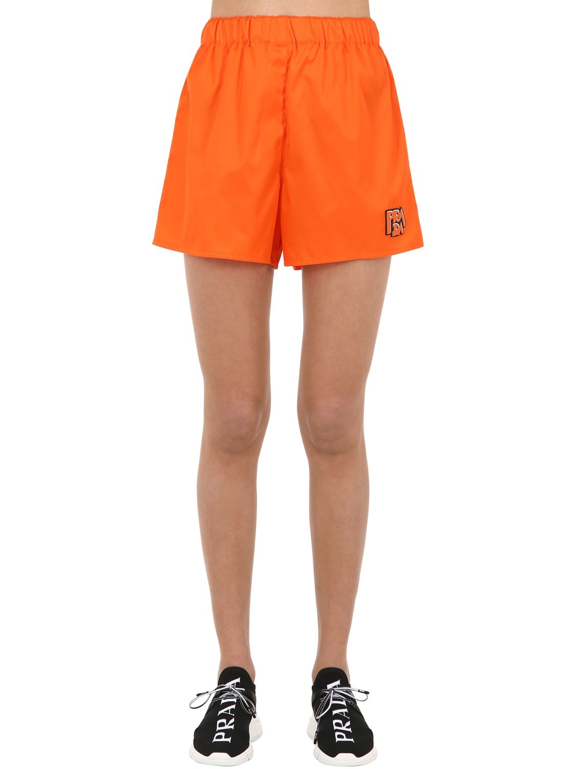 Prada Logo Patch Nylon Shorts In Orange